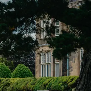 The stone walls and windows of Killarney House