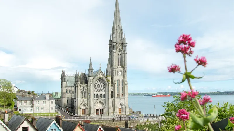 St Colman's Cathedral above the coloured houses on the Cobh waterfront