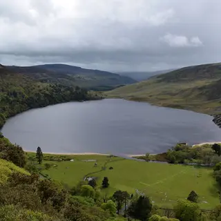 Lough Tay lying dark between the Wicklow hills