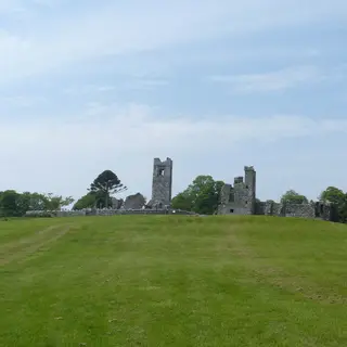 The ruined church and tower on the open summit of the Hill of Slane