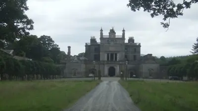 The long drive up to the front of Curraghmore House between its trees