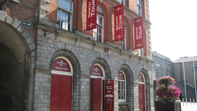 The brewery front at Smithwick's in Kilkenny with its red arched doors and banners