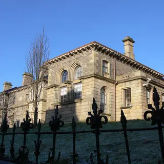 The stone front of the Model in Sligo behind its railings on a frosty morning