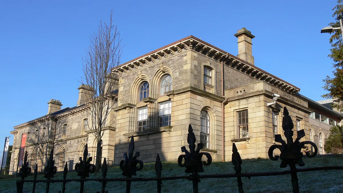 The stone front of the Model in Sligo behind its railings on a frosty morning