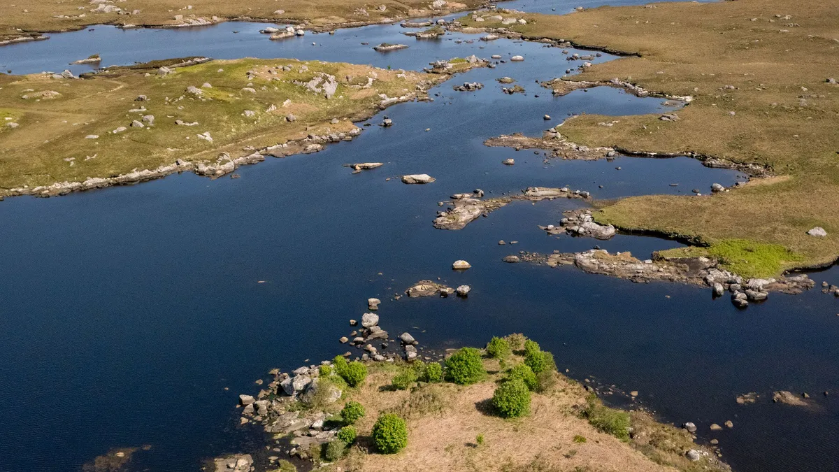 Lakes scattered through the Connemara landscape, seen from the air