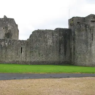The thick curtain walls and corner towers of Ballymote Castle