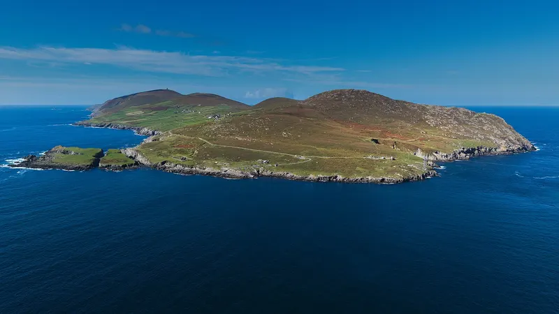 Dursey Island lying off the end of the Beara peninsula with the sound between