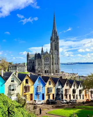 Coloured houses below St Colman's Cathedral in Cobh, County Cork