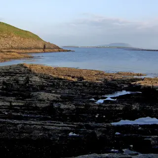 The rocky foreshore below Knocknarea with the mountain across the bay