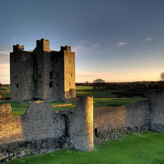 Trim Castle and its curtain wall at sunset