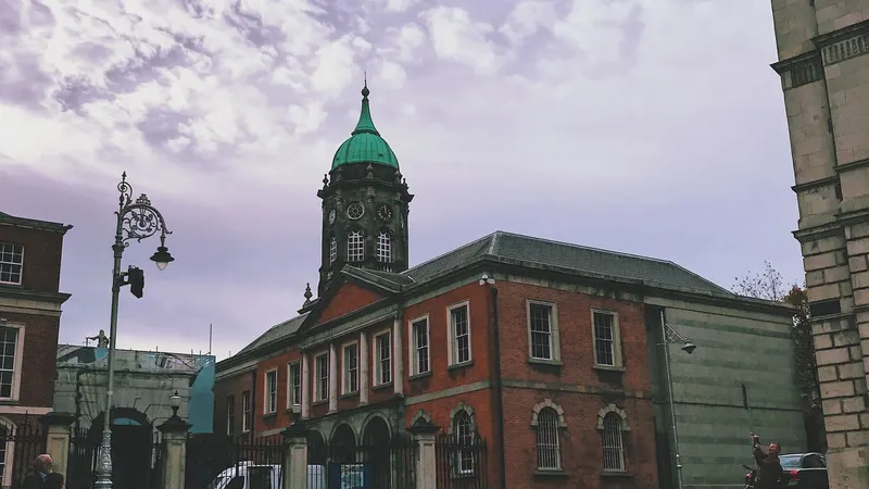 The courtyard at Dublin Castle with the clock tower at the end of it