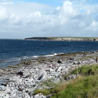 The rocky shoreline and low cliffs along the Flaggy Shore, County Clare