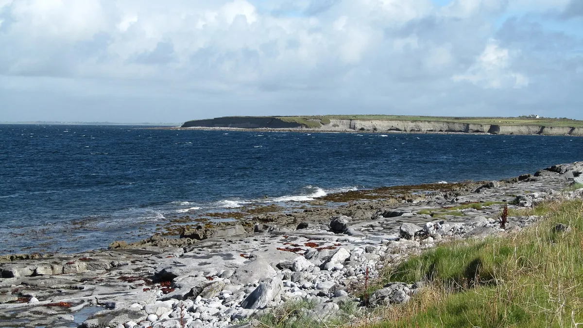The rocky shoreline and low cliffs along the Flaggy Shore, County Clare