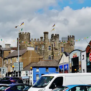 Enniscorthy Castle above the street with its flags flying