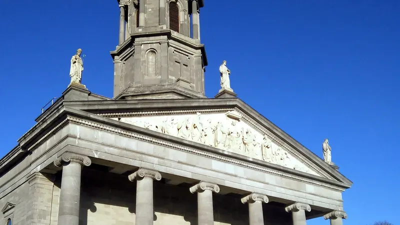 The columned portico and statues on the front of St Mel's Cathedral in Longford