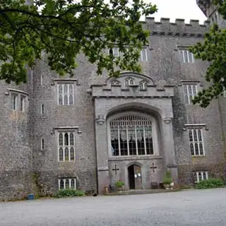 The battlemented front and arched doorway of Charleville Castle