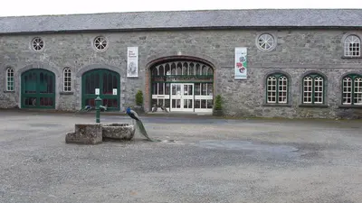 The arched stone yard buildings at Johnstown Castle estate