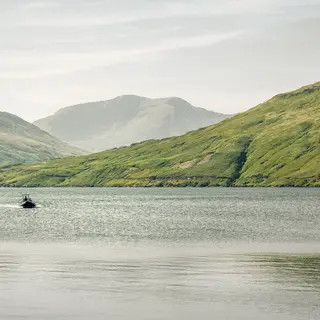 Mountains standing over the water at Leenane in County Galway