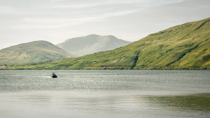Mountains standing over the water at Leenane in County Galway