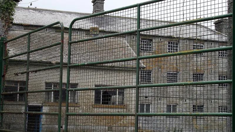 The stone workhouse building at Donaghmore behind its gates, County Laois