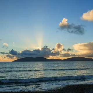 The sun going down over the beach at Waterville