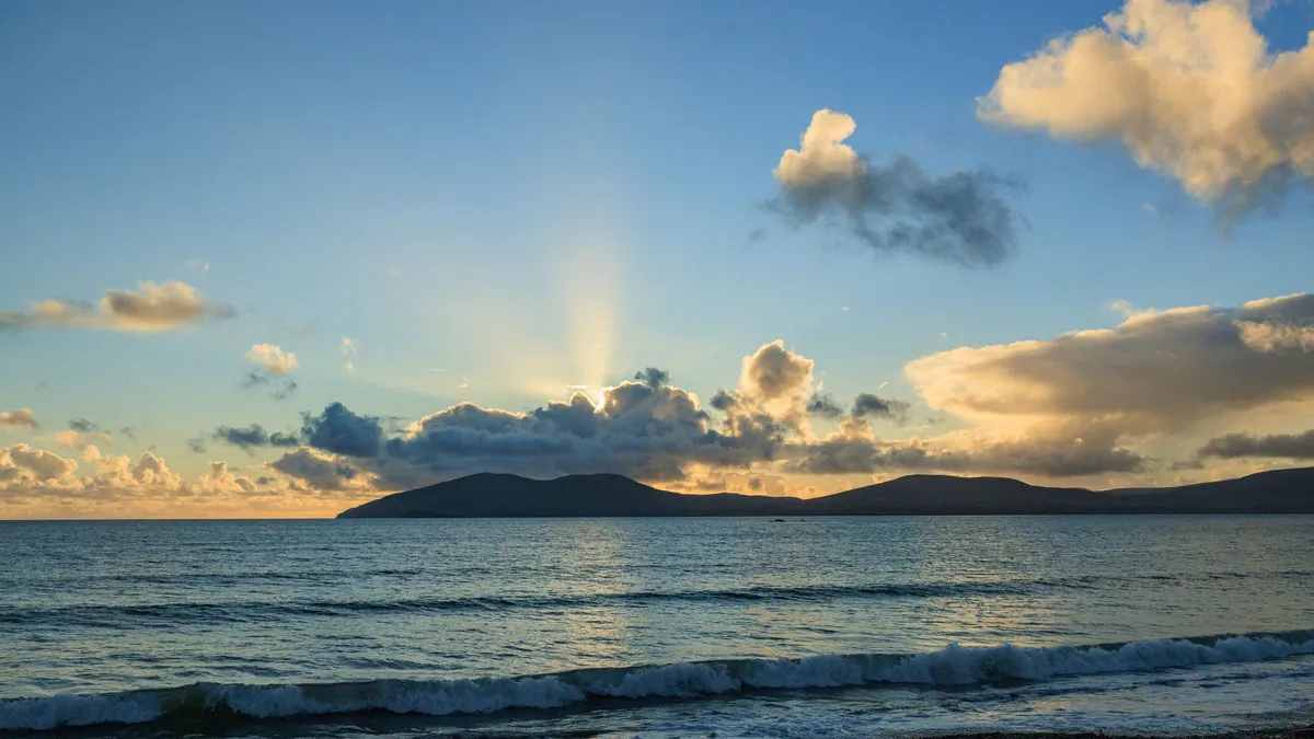 The sun going down over the beach at Waterville