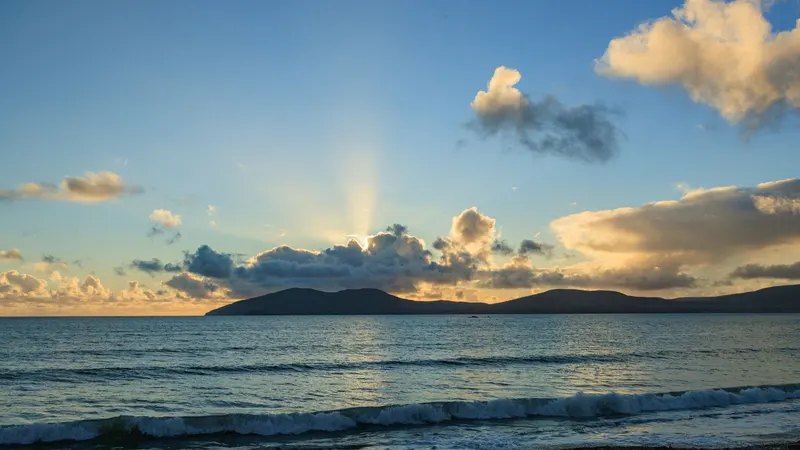 The sun going down over the beach at Waterville