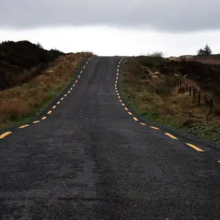 The mountain road over the Slieve Bloom Mountains between bog and forestry