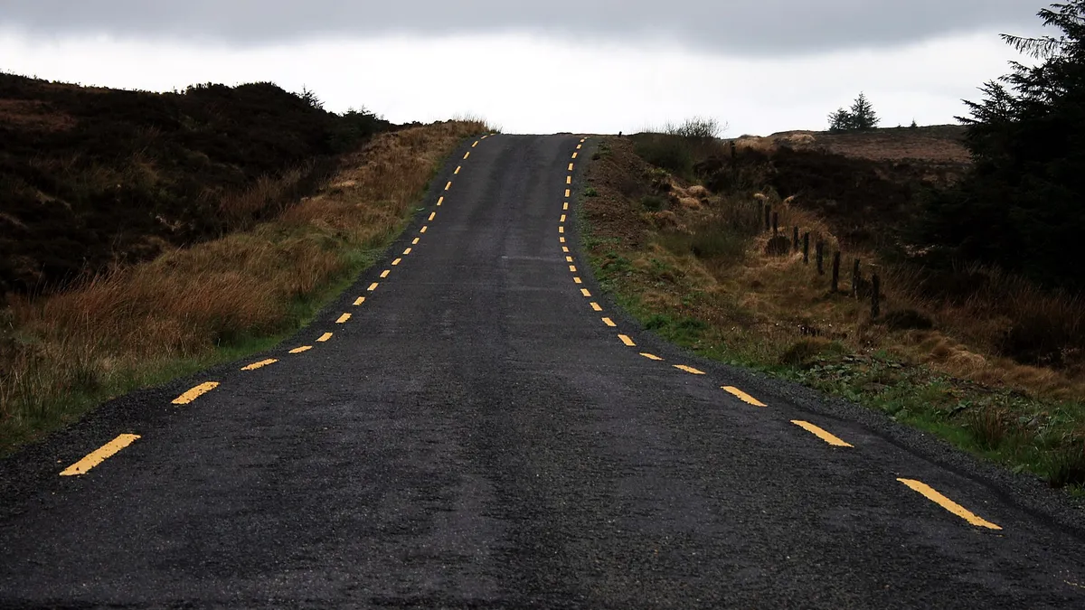 The mountain road over the Slieve Bloom Mountains between bog and forestry