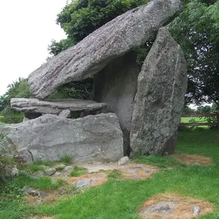 The long capstone of Kilmogue Portal Tomb leaning back on its uprights