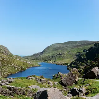 A lake between the rocky mountainsides of the Gap of Dunloe