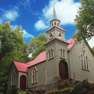 The corrugated iron exterior and spire of St Peter's tin church at Laragh