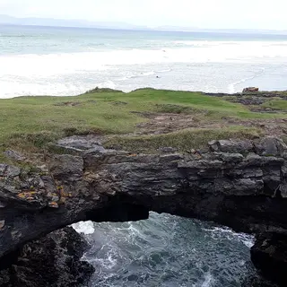 Sea arches cut into the rock at the Fairy Bridges outside Bundoran