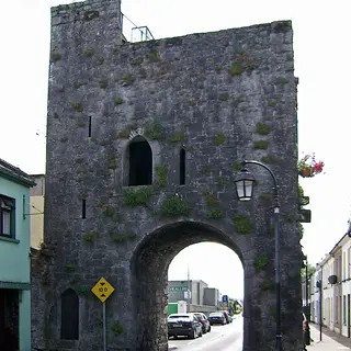 The medieval arch of Blossom Gate rising between the houses in Kilmallock