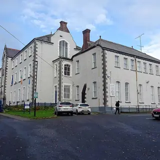 The white rendered front of Cavan County Museum on its corner site