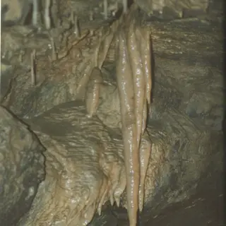 Stalactites hanging in a chamber of Aillwee Cave