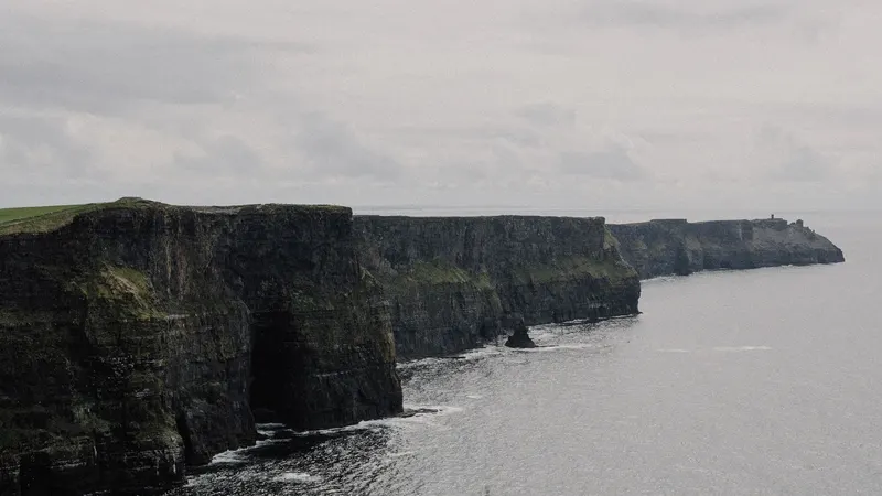 Waves breaking against the Cliffs of Moher on the Atlantic coast