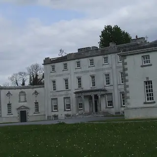 The Palladian front of Strokestown Park House with its curved wings