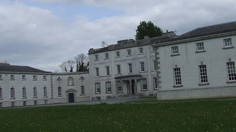 The Palladian front of Strokestown Park House with its curved wings