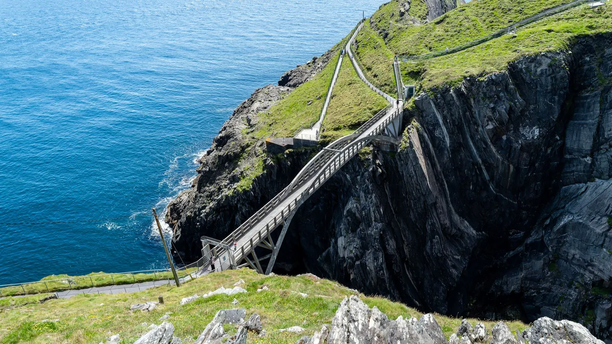 The footbridge and steps leading out to the signal station at Mizen Head